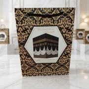 كيس كارطوني بالأسود والذهبي لتوزيعات الحج -مقاس 18× 24 سم